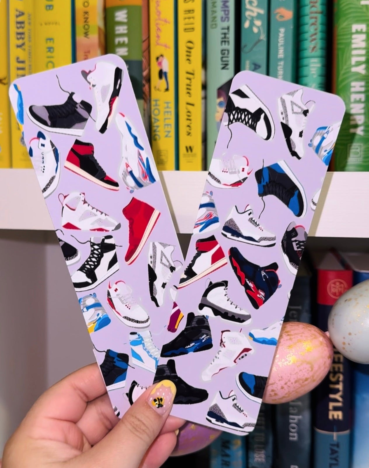 An assortment of Nike Jordan's across a grey background bookmark